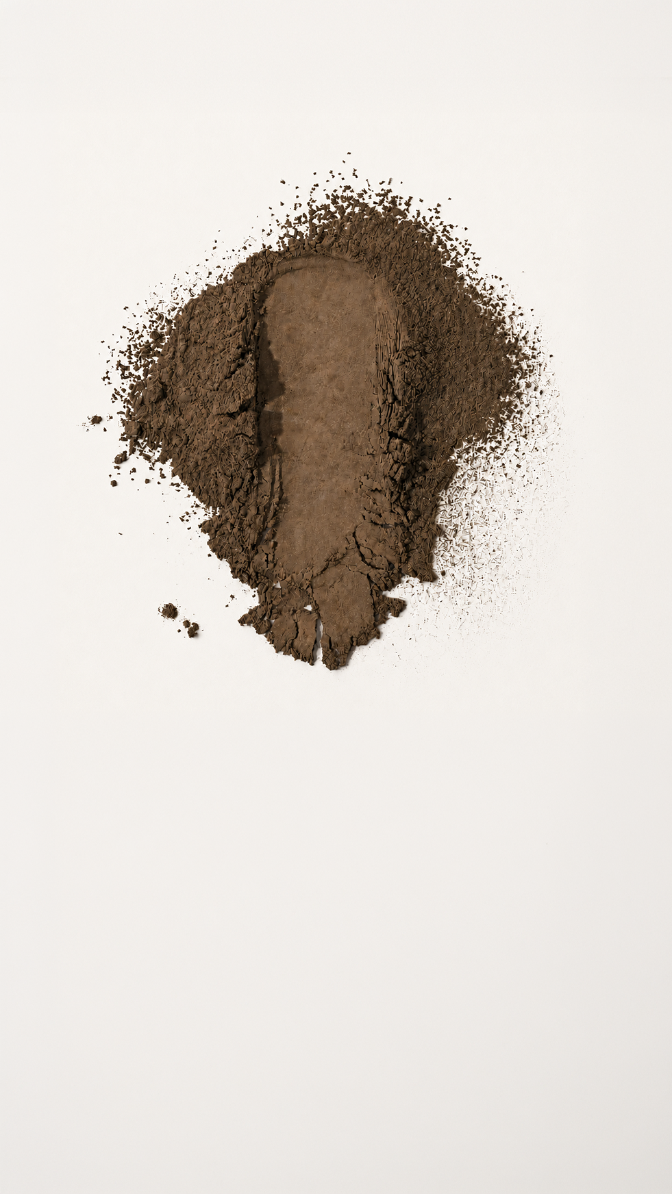 Single origin organic hojicha powder on white background showing the rich earthy brown colour of Japanese roasted green tea