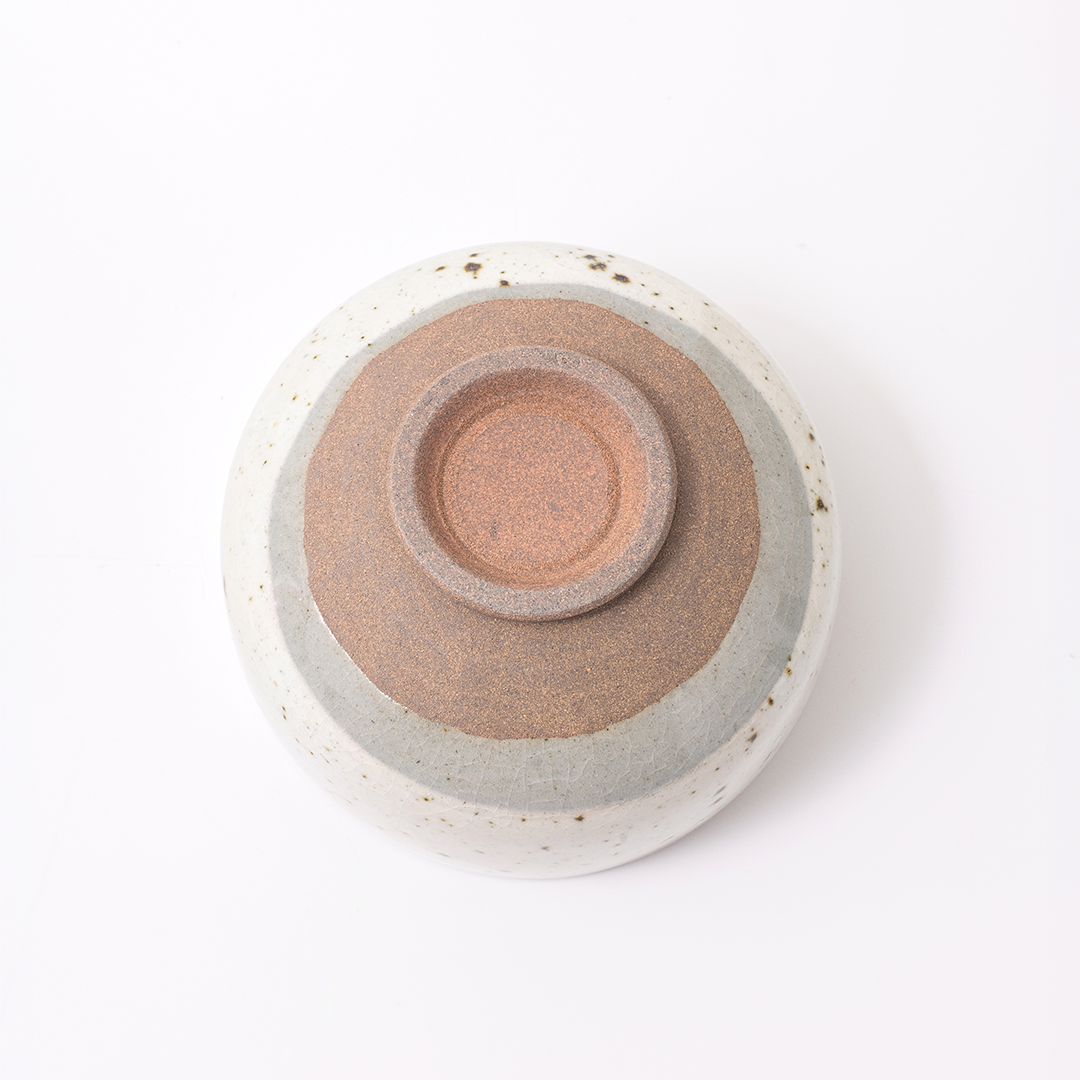 Ceramic bowl with two-tone design on a white background