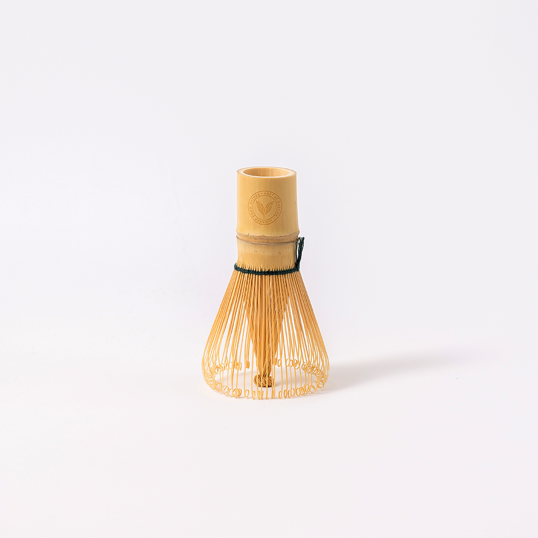 Bamboo whisk for matcha on a white background